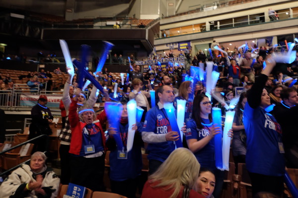 Clinton supporters cheer on their candidate as she takes the stage at the 100 Club Dinner. 