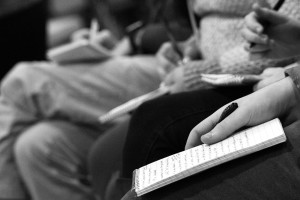 Students write down notes. Photo by Anna Sortino. 