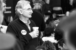 A man enjoys complementary coffee while waiting for the event to begin. Photo by Anna Sortino. 
