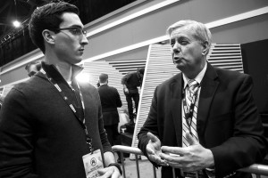 AU student Kyle VonEnde interviews Sen. Lindsey Graham in the spin room. Photo by Anna Sortino. 