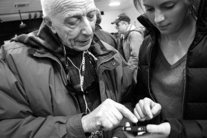 Shani Rosenstock teaches Professor Bennedetto about Snapchat. Photo by Anna Sortino. 