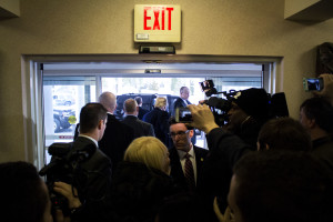 Donald Trump, surrounded by Secret Service, heads to his car. Photo by Anna Sortino. 