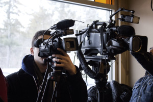 Ben Piccarreta films Governor Christie's town hall at Beanetown Coffeeshop. Photo by Anna Sortino. 