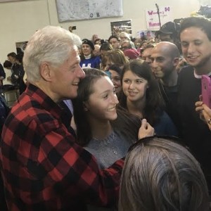 Former president Bill Clinton greets the crowd at a Hillary for America rally in Milford, N.H. Photo by DeLancey Lane