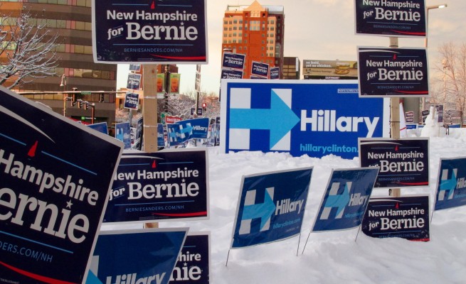 Campaign signs outside the Verizon Center before at the McIntyre-Shaheen 100 Club Celebration in   downtown Manchester. Photo by Mary-Margaret Koch