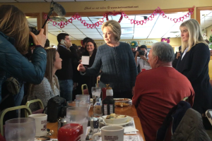 Clinton speaks with a father and daughter who say they won't vote for her Tuesday.