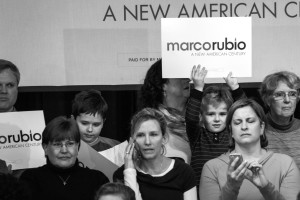 A young supporter holds up a Marco Rubio sign. Photo by Anna Sortino.