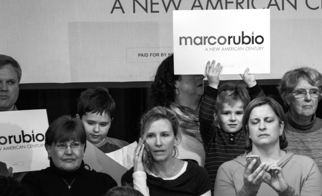 A young supporter holds up a Marco Rubio sign. Photo by Anna Sortino.