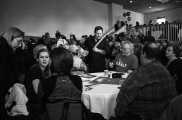 Guests wait for Carly Fiorina to speak at her pre-Super Bowl party. Photo by Anna Sortino