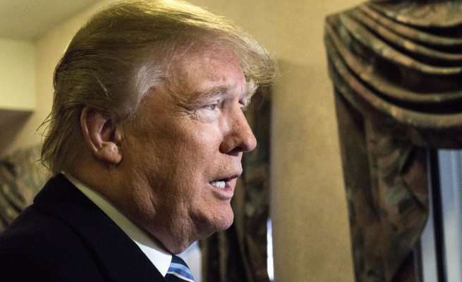 Donald Trump being interviewed on his way out of his hotel. Photo by Anna Sortino.