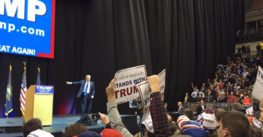 Donald Trump thanks a crowd of nearly 5,000 at the Verizon Wireless Arena in Manchester the night before the primary. Photo by Kyle VonEnde